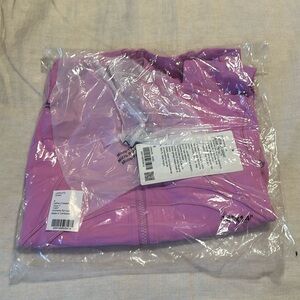 Define jacket cropped never worn and still in package